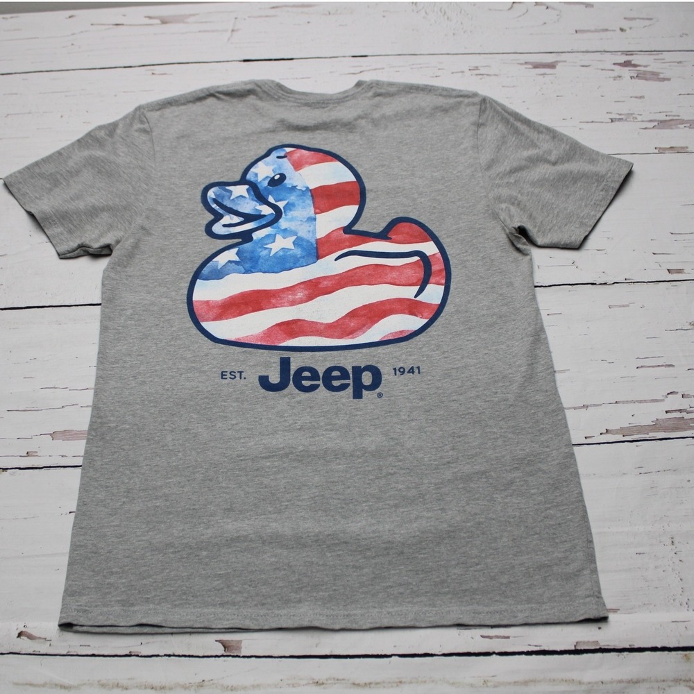 1) TITLE: Jeep x JEDCO Ducking American Flag Graphic Tee Gray M Americana